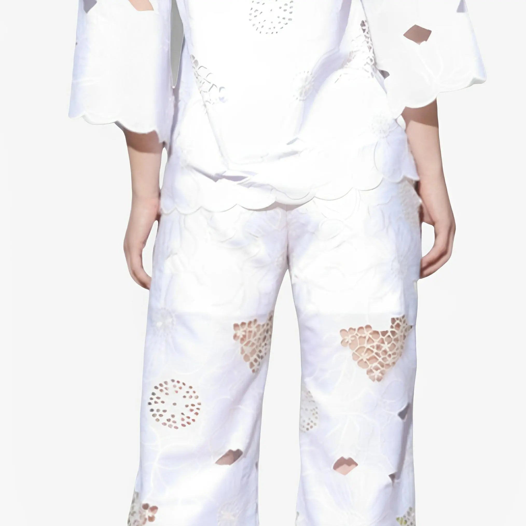 Off-White Embroidered Cotton Pants by Ton Âge